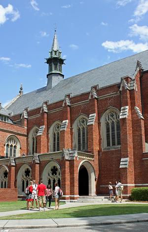 students gathered behind Flowers Hall